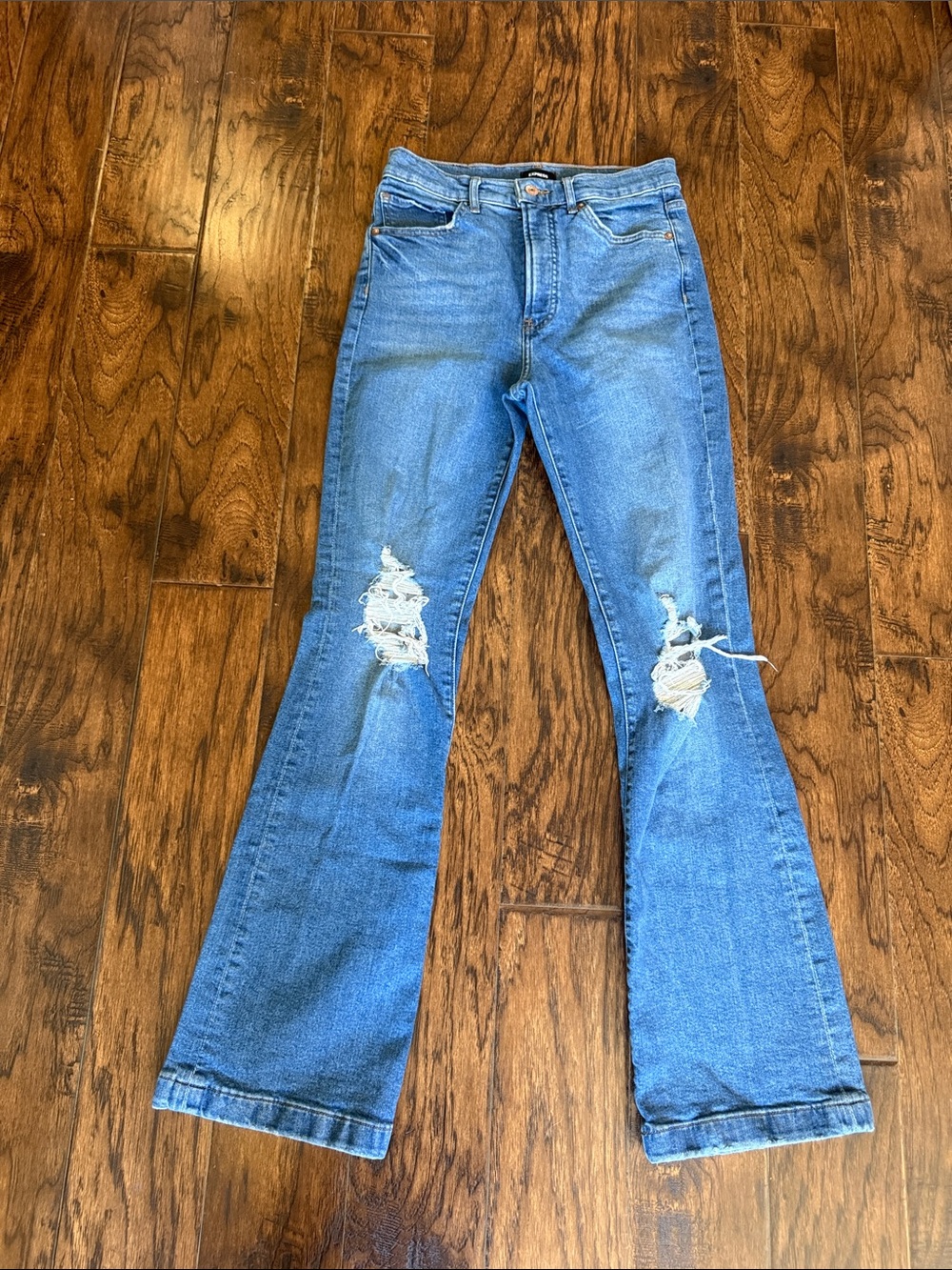 Express high rise, bootcut Blue Distressed jeans, size 6